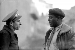 Abraham Lewis (r) of the Brigade Commissariat, with Chief of Auto Park Louis Secundy, Dec. 1937 (Tamiment Library, NYU, 15th IB Photo Collection, Photo # 11-1010)