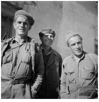 Joseph Dougher, Commissar, Mackenzie-Papineau, Company 3, Albert Harris, Brigade Intendencia, and Wally Sabatini, Political Commissary Mackenzie-Papineau, Company 3, October 1937. The 15th International Brigade Photographic Unit Photograph Collection; ALBA Photo 11; ALBA Photo number 11-0728.
