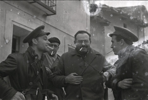 At Teruel, from left, XV International Brigade chief of operations Malcolm Dunbar, Herbert Matthews (in beret), Ernest Hemingway, and Republican General Enrique Líster.