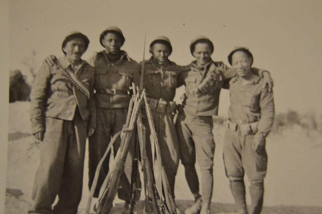 International volunteers in Spain. Left to right: a seaman from Chile; Sterling Rochester (USA); Artemio Luna (Philippines); Juan Santiago (Cuba); and Jack Shirai (Japan).