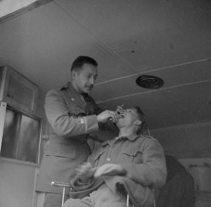 Dental Wagon at work, “Doc” Jack Klien, February 1938. The 15th International Brigade Photographic Unit Photograph Collection ; ALBA Photo 11; ALBA Photo number 11-0865. Tamiment Library/Robert F. Wagner Labor Archives. Elmer Holmes Bobst Library, 70 Washington Square South, New York, NY 10012, New York University Libraries
