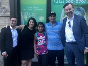 Immigration Justice Campaign volunteers smile alongside Bernardo* and his daughter following their release from detention and reunification. Bernardo and his daughter were forcibly separated at the border by the government in the summer of 2018.