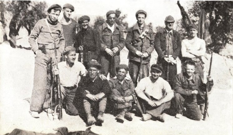 Irish volunteers in Spain: Eddie Flaherty, Company Commander, extreme left, standing. From the Book of the XV Brigade.